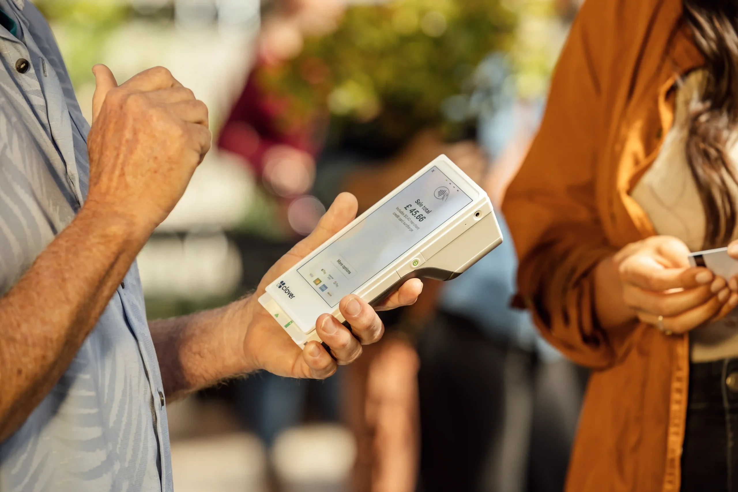 man taking card payment